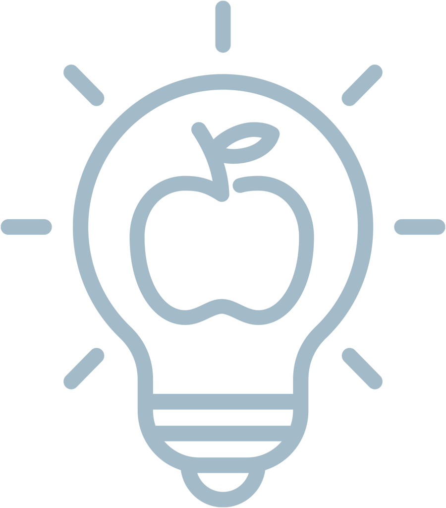 an apple in the center of a lit lightbulb icon
